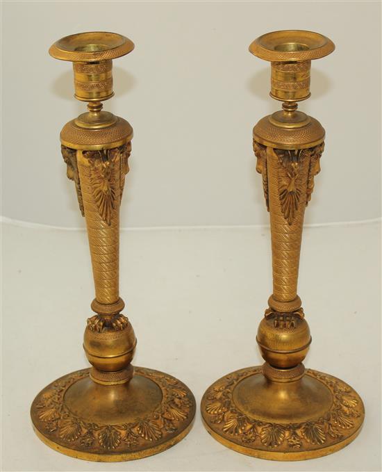 A pair of 19th century French Empire style ormolu candlesticks, 13.75in.